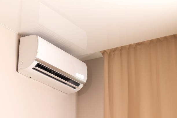 Modern ductless HVAC system installed on a wall, providing efficient heating and cooling without ductwork