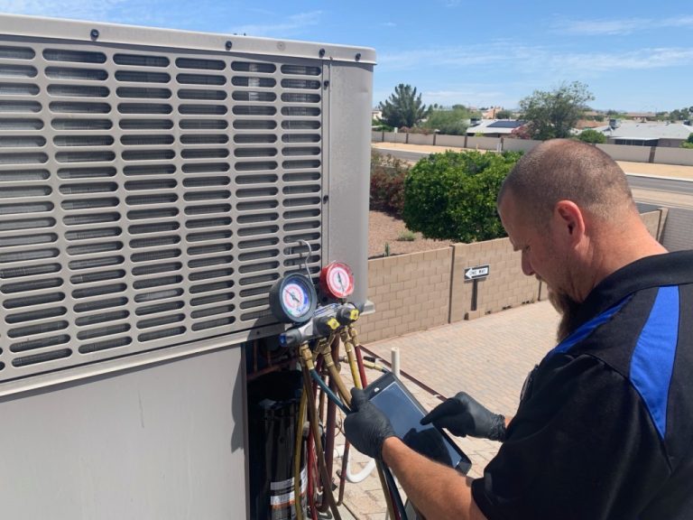 HVAC technician working on a heating and cooling system, wearing a uniform and using tools to inspect and repair the equipment.